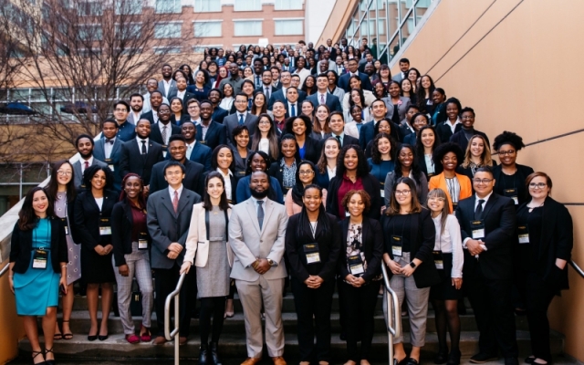 FOCUS 2019 student cohort standing on stairs outdoors